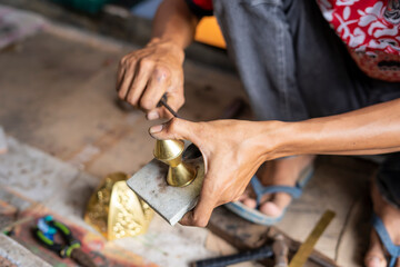 Craftsmen of traditional muslim lantern lamps in Cianjur are called "Lampu Gentur". Lampu Gentur are one of the handicraft products that are characteristic of Cianjur, Indonesia.