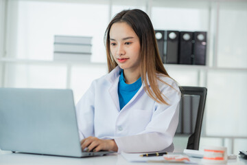 female dentist Denture model, tooth simulator and survey mirror tool for showing and explaining to patients at clinic office, dental health care concept.