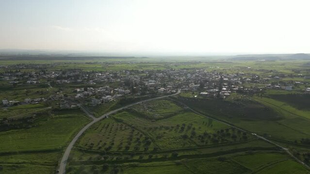  Landscape. Meadows, hills and plains of Cyprus. Road. A small town. Cyprus. Smooth movement to the right