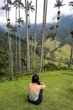 Woman sitting and enjoying the views of Cocora Valley
