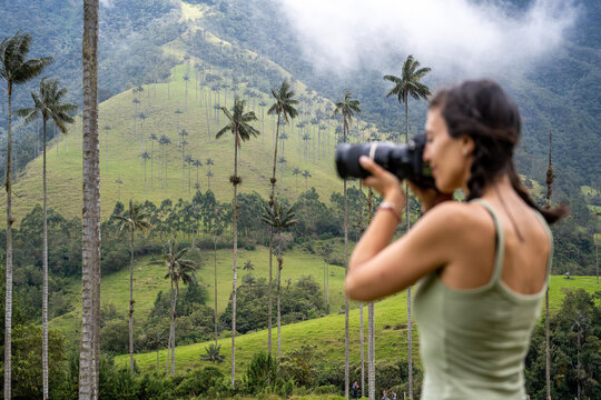 Blurred woman taking pictures in the Cocora Valley