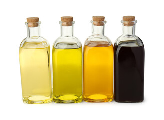 Vegetable fats. Bottles of different cooking oils isolated on white