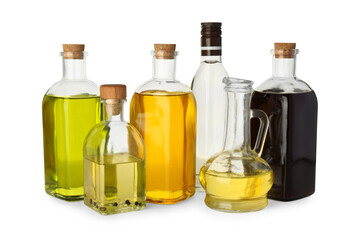 Vegetable fats. Glassware of different cooking oils isolated on white