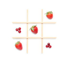 Tic tac toe game made with berries isolated on white, top view