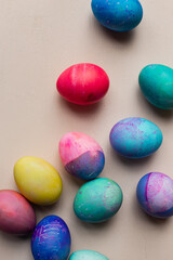 Dyed easter eggs against a pink backdrop