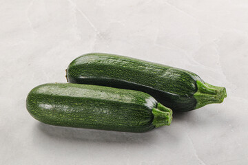 Raw green ripe zucchini vegetable
