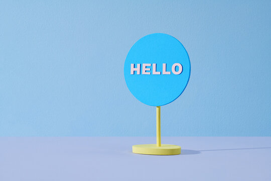 Hello signboard isolated on light color background