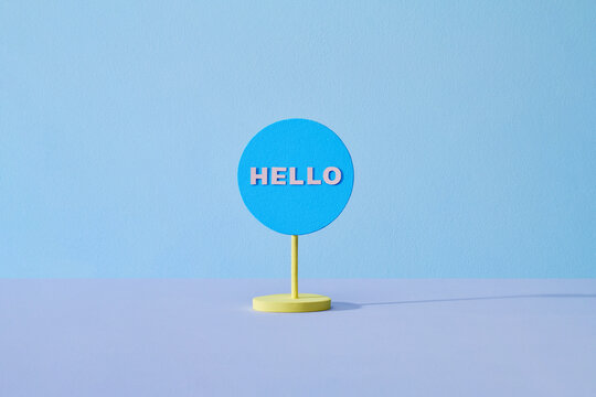 Hello word on a circle board on a blue background