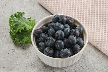 Sweet ripe blueberry on the bowl
