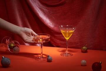 Gold wine and ornaments on table on velvet