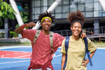 Portrait of cheerful high school lovers 