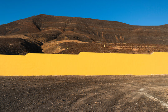 Yellow wall in the desert