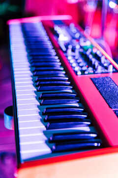 Synthesizer on scene during concert