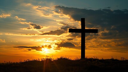 Silhouette christian religious cross on sunrise sky background