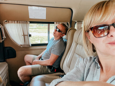 Woman enjoying a sightseeing trip with her husband. 