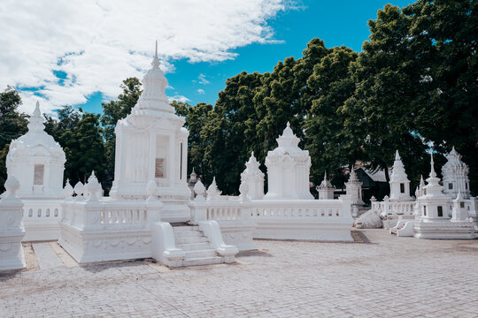 Whitewashed mausoleums at Wat Suan Dok temple in Chiang Mai
