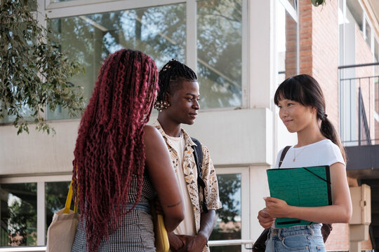 Group of Students talking after class