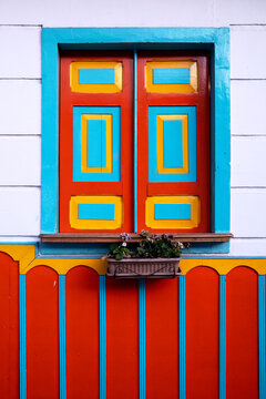 Traditional Colombian window full of colors closed
