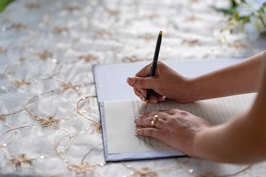 Bride Hand Signing