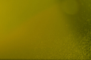 yellow-green abstract background with small glare splashes, highlights and light gradient