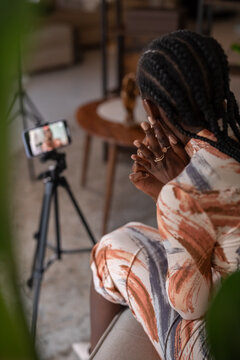 Black female influencer creating content for blog