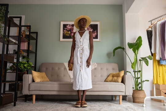 Black woman in summer white dress