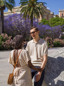 Diverse couple spending time in city
