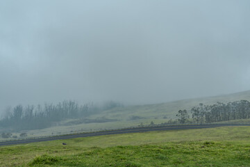 The Haleakalā Highway is a 37-mile road from the town of Kahului, Maui to the summit of Haleakalā. The Haleakalā Highway cultural landscape is a historic district that includes the portion of the high