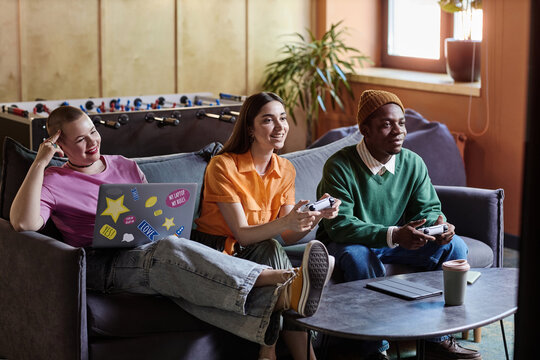 Young Office Workers In Recreation Room