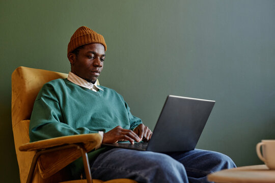 African American Manager Working On Laptop