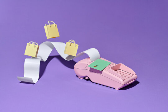Credit card reader, shopping bags and small wrapped boxes