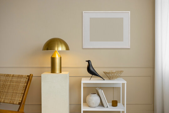 Frame with a blanck space against a fashionable room