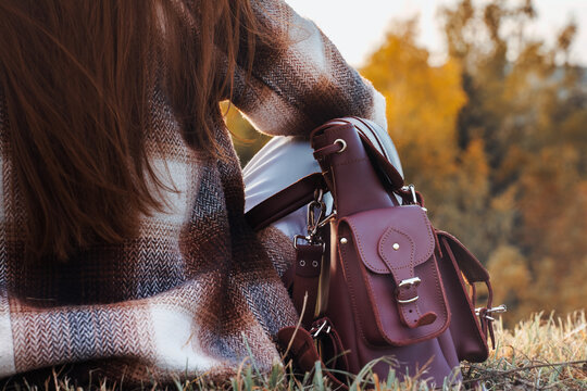 Unrecognizable woman with backpack enjoy autumn fall nature