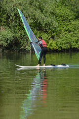 a man during wind surfing practice
