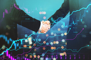 abstract handshake and forex chart on blurry bokeh night city background. Financial growth and...