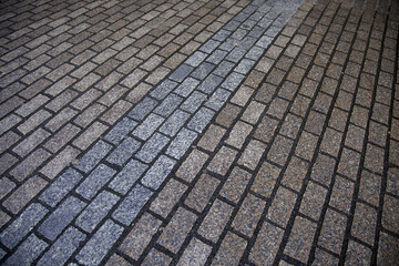 Old wet cobblestone floor