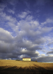 Barn with storm sky