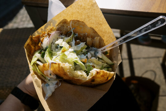 pov ugc of d&ouml;ner kebab fast food in hand