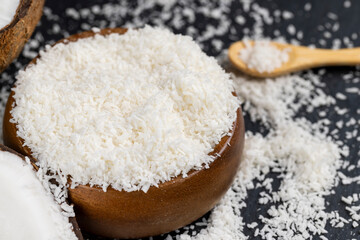 Fototapeta na wymiar dry white coconut chips for adding to desserts