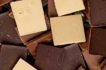 white, bitter and milk chocolate pieces