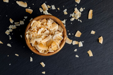 sweet orange and yellow coconut flakes fried in sugar