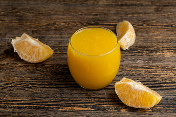 orange juice in a glass cup close-up - 751253380