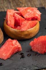 sliced into pieces of red ripe watermelon