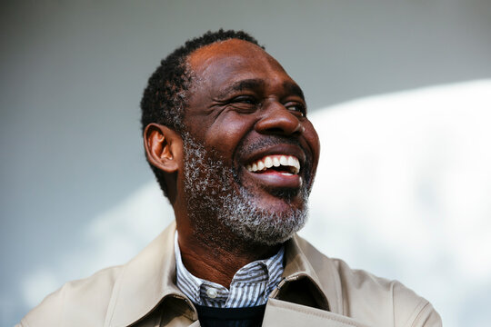 Cheerful businessman in stylish outfit