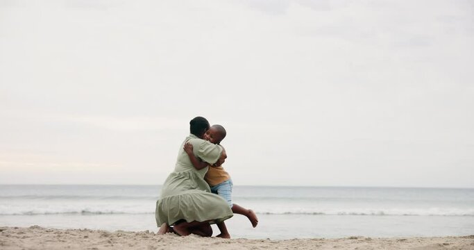 Son, child and mother with hugging on beach for bonding, playing and affection with happiness or sea waves. Black family, mom and kid by ocean with love, care or embrace on holiday, relax or vacation