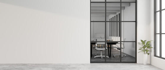 A contemporary white office corridor features a window showing the meeting room and a white wall.