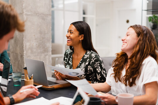 Office Workers In Office Meeting