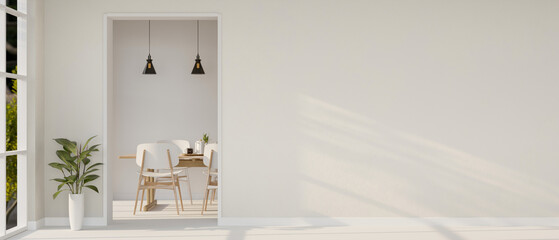 The interior design of a contemporary white home corridor through a dining room.