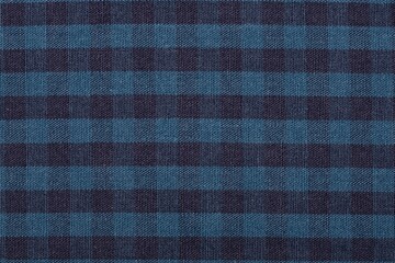 Navy blue checkered fabric a background or texture
