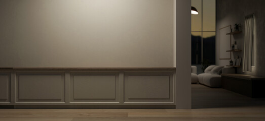 The interior design of a contemporary home hallway corridor at night features a wall with moulding.